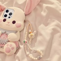 Coque de téléphone antichoc en silicone avec oreilles de lapin en peluche et design de dessin animé pour toutes les séries d'iPhone, y compris iPhone 17, 16, 15, 14