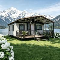 Casa Contenedor Prefabricada Moderna y Expandible con Techo Inclinado, Porche y Varios Materiales de Pared para Jardín, Campamento o Casa de Huéspedes