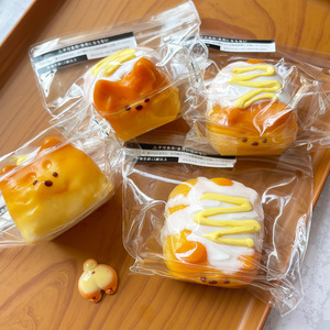 Jouets à presser en silicone réalistes en forme de pain avec expression de chiot de 6,5 cm, cadeaux anti-stress pour tous les âges pour un bonheur instantané, qualité alimentaire sûre - Product Image 1