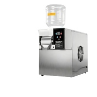 Automatische sneeuwvlokken-ijsmachine voor op het aanrecht, met melk-ijs-shaver en rollerontwerp voor dagelijks gebruik in commerciële voedselwinkels