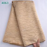 Tissu en dentelle brodée africaine bleue unie en gros 2025, dentelle damassée dorée brodée à la française pour robes de mariée femme 4063