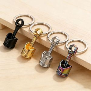 Llaveros Metálicos 3D Personalizados Creativos, Mini Pistones, Cadenas, Colgantes, Chapados en Oro y Plata - Product Image 1