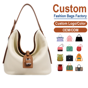 กระเป๋าถือใต้วงแขนหนังวัวชั้นบนสุด สีครีมขาว ดีไซน์หรูหรา พรีเมียม สำหรับทำงาน รับผลิตแบบ OEM - Product Image 1