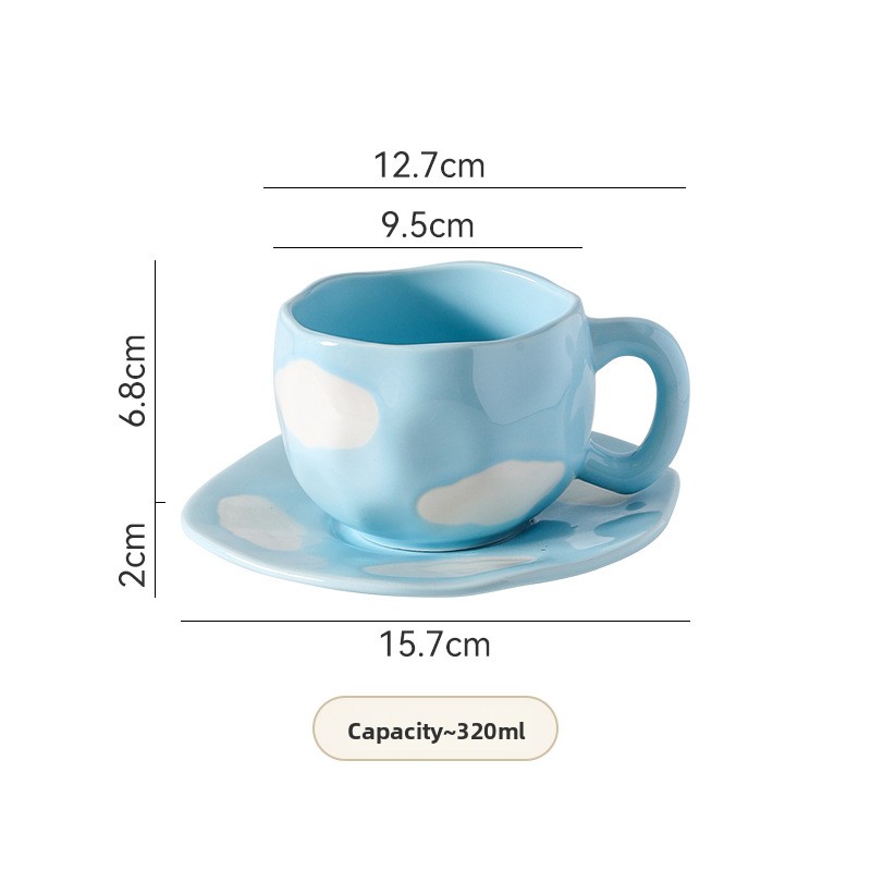 Tasse et soucoupe bleu foncé peintes à la main