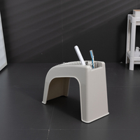 Repose-pieds ergonomique Hore pour pédicure, tabouret empilable en plastique PP avec compartiment de rangement pour salon et maison