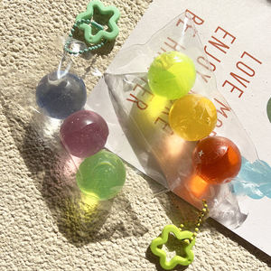 Jouet sensoriel anti-stress en forme de boule de sucre arc-en-ciel - Matériau TPR souple pour enfants - Product Image 5