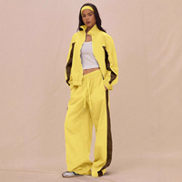 Ensemble tendance décontracté pour femme : veste zippée à rayures color block et pantalon à lacets
