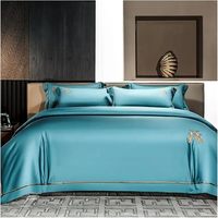 Ensemble de literie 4 pièces pour hôtel haut de gamme broderie à rayures dorées housse de couette en coton égyptien drap-housse avec deux taies d'oreiller