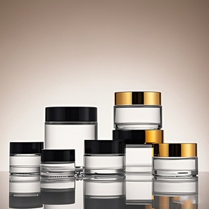 Hot Sale 15g 30g 50g 100 Empty Luxury Customized Skin Care Face Eye Cream Lotion Vaccum Transparent Glass Jar and Gold Black Lid - Product Image 1
