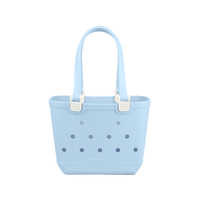 Nouveau cadeau à la mode mignon adapté petite fille sac à main en silicone avec double poignées et décoration en forme de fleur pour le voyage
