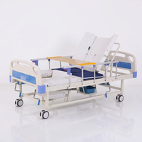 Lit médical et de soins à domicile multifonctionnel manuel avec trou pour commode, lit de soins à bascule réglable, table à manger et barreaux latéraux