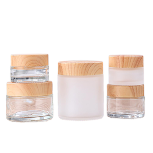 Tarro de Plástico PET Transparente/Ámbar Esmerilado Natural de Lujo al por Mayor de 150g/250g para Mantequilla Corporal y Crema para Ojos con Tapa de Bambú - Product Image 6