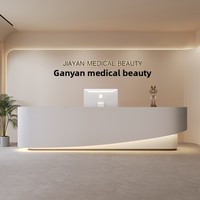 Bureau de réception laqué moderne haut de gamme personnalisé pour les cours de formation en studio de yoga de bureau d'esthétique médicale-pour caissier de réception