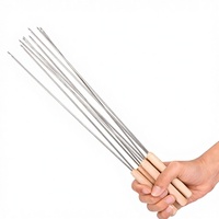 Aiguille à kebab en acier inoxydable de qualité alimentaire avec manche en bois, outil jetable inodore et non toxique pour barbecue, idéal pour la viande.