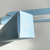 Boîte d'emballage simple pour produits de soin de la peau, en papier pliable avec finition noire métallisée