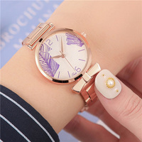 Jam Tangan Wanita Fashion Motif Daun Pita dengan Mesin Quartz Ramah Lingkungan, Model Tali Mesh, Laris untuk Perdagangan Lintas Negara