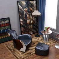 Fauteuil de salon individuel en cuir de vachette style rétro industriel, type selle de cheval, en chêne, pour une relaxation optimale