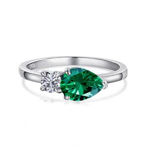 Dylam Top End Collection Rhodium Plated 925 Sterling <b>Silver</b> Diamond Sparkling Tear Oval <b>Emerald</b> Two Stone 5A Zirconia <b>Ring</b> - Product Image 1