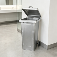 Conteneur à déchets en acier commercial avec roues et couvercle, poubelle métallique robuste pour usage extérieur en zone publique