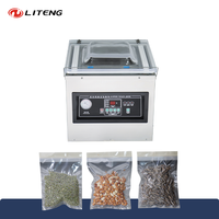 Machines d'emballage sous vide automatiques de type table DZ-400 500 600 pour poisson et poulet avec deux barres de scellage