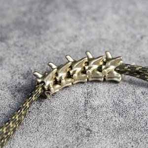 Tiebro Handmade Woven Lanyard Pendants Spine Bone Brass Knife <b>Beads</b> Outdoor EDC DIY Bracelet Charms Umbrella Fidget Spinners - Product Image 1