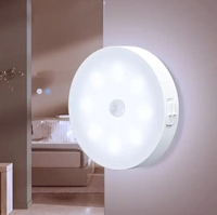 Mini lampe de nuit à LED blanc chaud alimentée par piles AAA en matériau ABS avec capteur de mouvement pour couloir, chambre à coucher, couloir avec détection de présence humaine