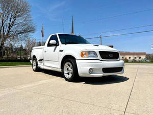 รถกระบะมือสองราคาถูกที่ดีที่สุด ปี 2000 F-150 SVT 2 ประตู ซูเปอร์ชาร์จ รุ่นมาตรฐาน แบบสเต็ปไซด์ พวงมาลัยซ้าย เบาะหนังด้านหลัง - Product Image 5