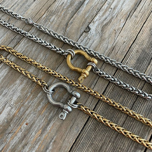 Collier personnalisé en acier inoxydable 316L plaqué or 14k 18k avec chaîne fouet et fermoir fer à cheval à clipser, pour ajouter une breloque, pour femme, vente en gros - Product Image 1