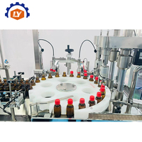 Automatische 10-200ml vloeistofvulmachine voor siroop, sap, orale druppels, vitamine, kruidenextracten, flessen en lichaamsmassageolie
