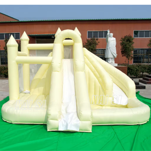 Château gonflable commercial jaune avec piscine à balles et toboggan pour fêtes d'anniversaire et événements de mariage - Product Image 1