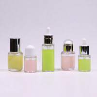 Cosmétiques personnalisés flacon compte-gouttes en plastique transparent PETG à paroi épaisse flacon compte-gouttes d'huile de beauté du visage flacon compte-gouttes d'essence