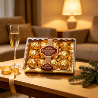 Ensemble de chocolats à la truffe fourrés aux noisettes, emballés dans un coffret doré haut de gamme, RISHDENE, élégante boîte cadeau transparente