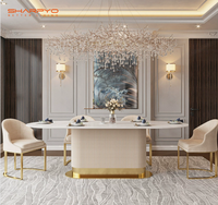 Table à manger ovale en pierre frittée de luxe moderne, mobilier haut de gamme durable, table et chaises pour hôtels et restaurants