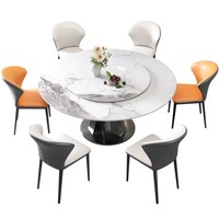 Ensemble table et chaises de salle à manger modernes et minimalistes avec plateau en pierre brillante ; Table à manger pivotante compacte pour petites maisons, au design élégant