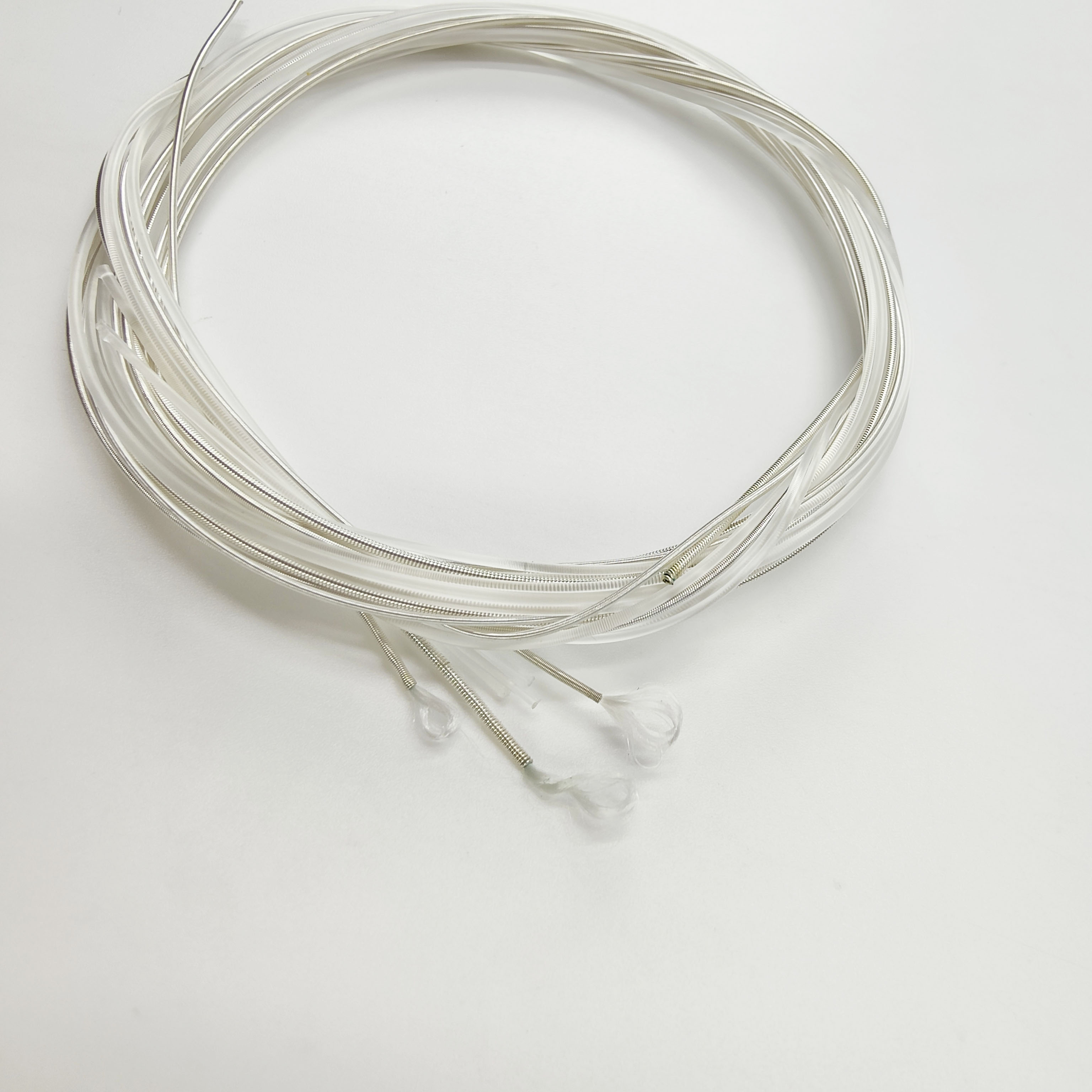 Plata níquel: guitarra clásica de 4 cuerdas, general.