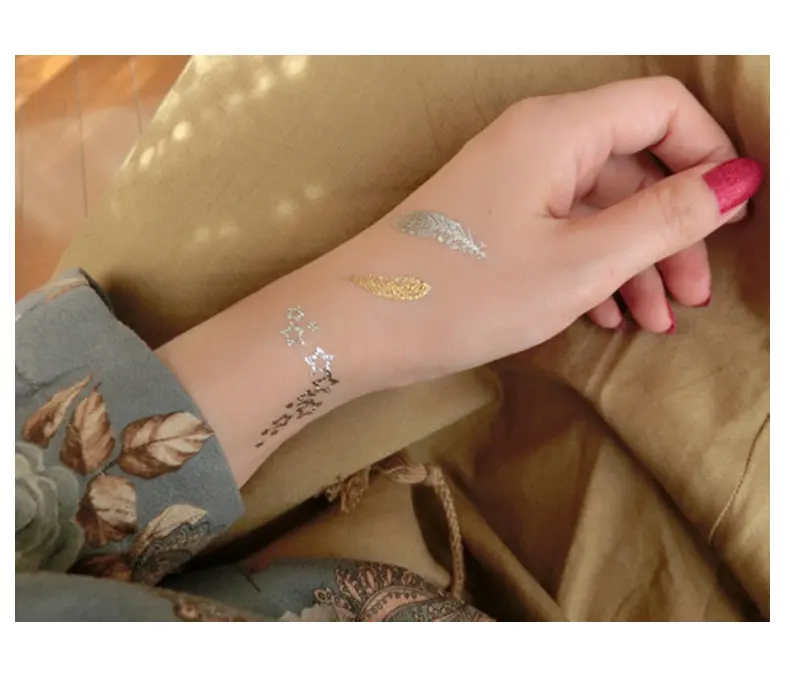 Tatuaggio temporaneo metallico di modo del corpo autoadesivo del tatuaggio dell'oro personalizzato tatuaggio temporaneo della stagnola dei gioielli del tatuaggio metallico