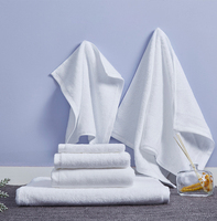 Linge de lit doux et absorbant de qualité supérieure pour hôtel Ensemble de serviettes de toilette de luxe en coton blanc personnalisé pour salle de bain