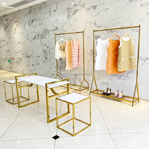 Soportes de <span class=keywords><strong>ropa</strong></span> y estantes para zapatos, muebles de exhibición de <span class=keywords><strong>tienda</strong></span> de lencería, mesas de anidación doradas, baratos, precio de fábrica - Product Image 2