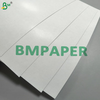 Papier cartonné brillant 310 g/m² double face, noyau noir, lisse, pour cartes TCG