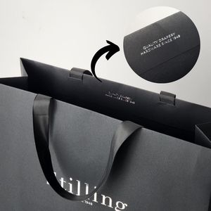 Bolsa de embalaje de ropa de compras de papel impreso con logotipo estampado en plata personalizado al por mayor para tienda de ropa - Product Image 3