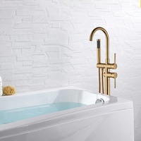 Ensemble de robinetterie de baignoire autoportante en laiton chromé doré pour projets hôteliers de luxe, avec mitigeur de douche moderne effet pluie et douchette à main