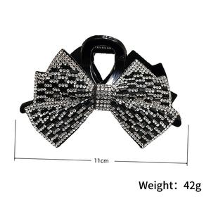 Pince à cheveux de luxe avec nœud papillon, strass scintillants et pince requin en plastique pour femme - Product Image 3