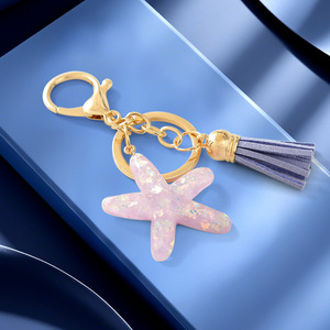 Porte-clés Étoile de mer en cristal avec pendentif pompon, impression UV couleur intégrale, pour sacs d'école et accessoires de clés pour femmes - Product Image 6