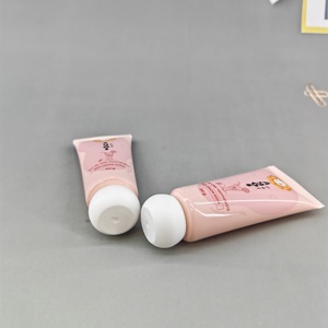 Tube de dentifrice rose rond 50g, emballage cosmétique pour soins de la peau avec design de dessin animé, bouchon à vis blanc pour soins personnels - Product Image 1