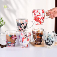 Vente en gros de tasses en verre à double paroi en borosilicate de haute qualité, résistantes à la chaleur, avec fleurs séchées