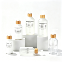 Vente en gros d'emballages cosmétiques vides en PET, flacon pompe cylindrique pour shampoing, logo personnalisé imprimé, marque privée, soin de la peau, sérum capillaire