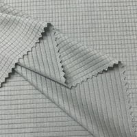 Tissu en maille extensible 4 directions 100% polyester 120gsm à carreaux respirant et absorbant l'humidité pour vêtements de sport et de gym