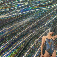 Lots de stock Tissu élastique en polyamide et élasthanne brillant, à points de dorure à chaud mystiques et feuille métallique, pour vêtements de danse et maillots de bain