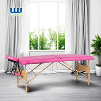Lit de massage de salon pliable personnalisé Unirelax, lit de massage portable en bois réglable de luxe pour la beauté du visage