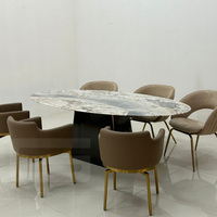 Meubles Gainsville Meubles de maison légers de luxe de forme ovale avec plateau en pierre Table à manger moderne en acier inoxydable Ensemble de table à manger